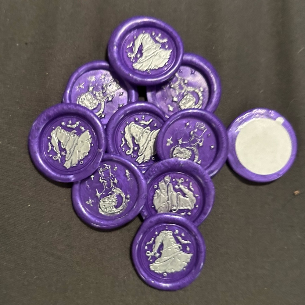 Wax seal with adhesive backing